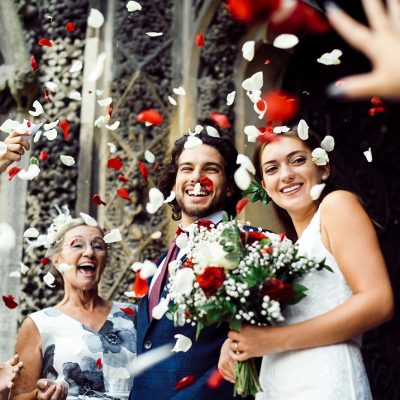 family-throwing-rose-petals-at-the-newly-wed-bride-2022-12-16-00-29-33-utc-1.jpg