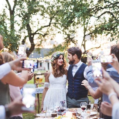 guests-with-smartphones-taking-photo-of-bride-and-2022-02-02-03-47-49-utc1.jpg